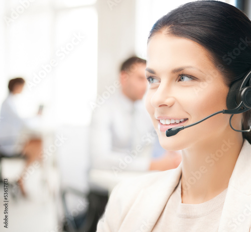 Photo: female helpline operator in call center female helpline operator in call center