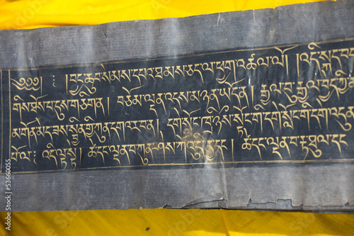 Photo: Old Tibetan language on old paper Old Tibetan language on old paper