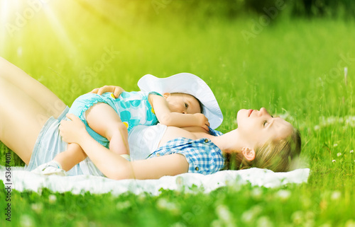 Photo: happy family. Mother and baby are resting, relax sleep happy family. Mother and baby are resting, relax sleep