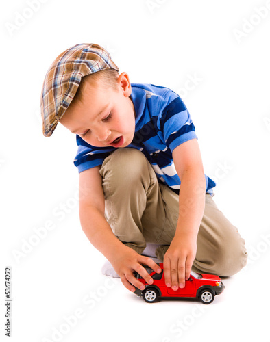Photo: Boy and toy car Boy and toy car