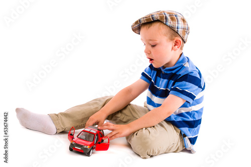 Photo: Boy and toy car Boy and toy car