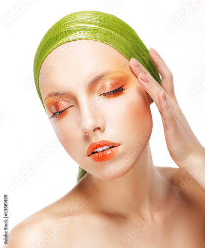 Photo: Beautiful Woman in Light Green Bandana. Creative Glossy Makeup Beautiful Woman in Light Green Bandana. Creative Glossy Makeup