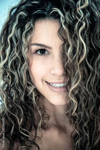 Photo: Woman with beautiful curls Woman with beautiful curls
