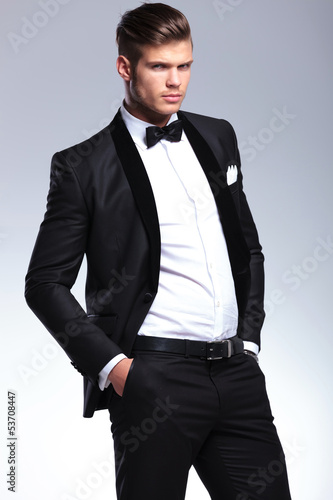 Photo: business man with hands in pockets business man with hands in pockets