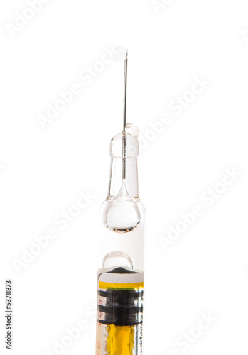 Photo: syringe with a vaccine syringe with a vaccine