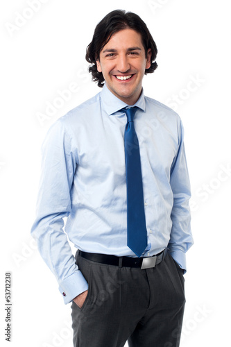 Photo: Confident young entrepreneur in formals Confident young entrepreneur in formals