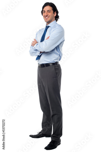 Photo: Business male in formals, full length portrait Business male in formals, full length portrait