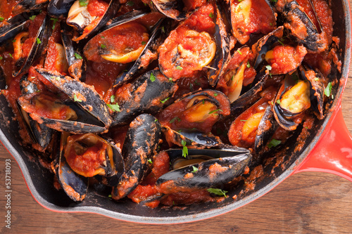 Photo: Mussels on stirfried tomato sauce Mussels on stirfried tomato sauce