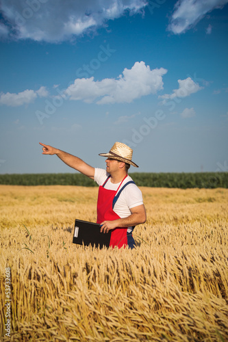 Photo: farmer in field farmer in field