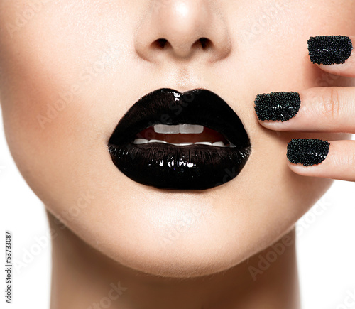 Photo: Trendy Black Caviar Manicure and Black Lips. Fashion Makeup Trendy Black Caviar Manicure and Black Lips. Fashion Makeup