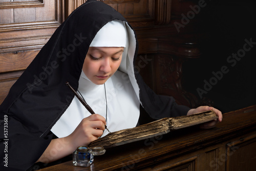 Photo: Vintage nun with book Vintage nun with book