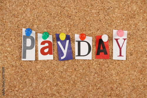 Photo: Payday on a cork notice board Payday on a cork notice board
