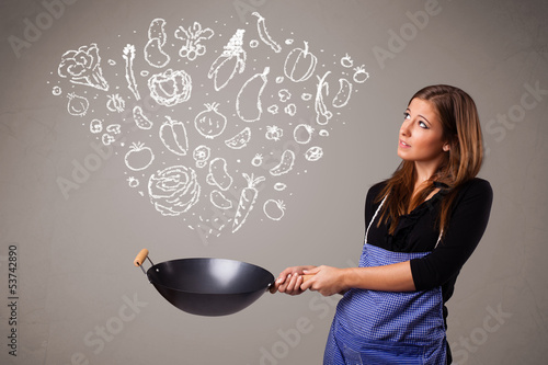 Photo: Woman cooking vegetables Woman cooking vegetables