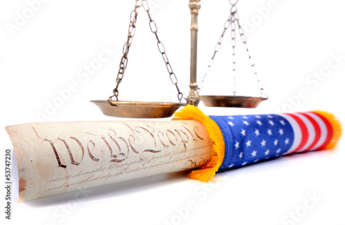 Photo: Scales of justice , American flag and US Constitution Scales of justice , American flag and US Constitution
