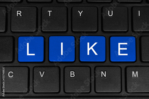 Photo: The word like made of four blue buttons The word like made of four blue buttons