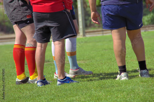 Photo: Equipiers sur un terrain Equipiers sur un terrain