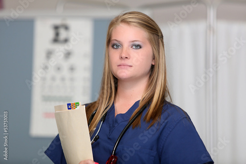 Photo: Nurse in Examination Rooom Nurse in Examination Rooom