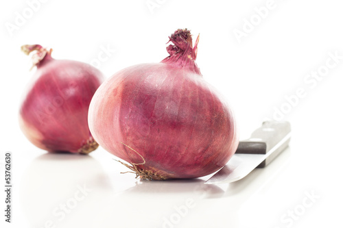 Photo: Cutting red onions for delicious salad Cutting red onions for delicious salad