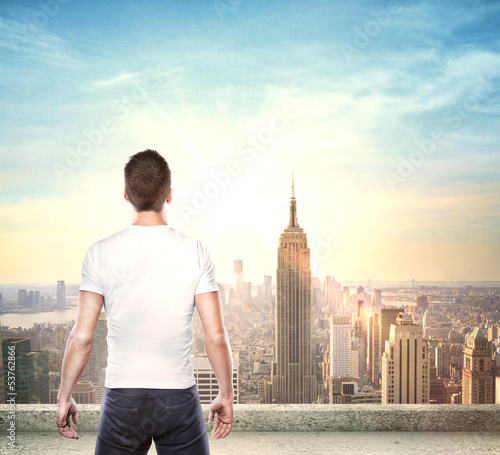 Photo: boy looking at city boy looking at city