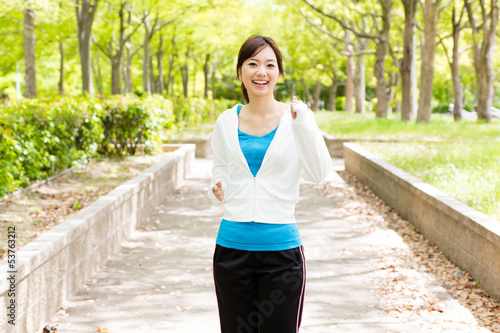 Photo: young asian woman in the park young asian woman in the park