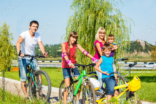 Photo: Parents and kids cycling Parents and kids cycling