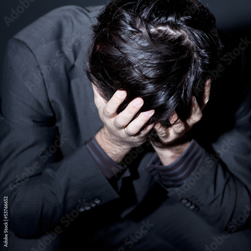 Photo: Businessmann mit Depression Businessmann mit Depression