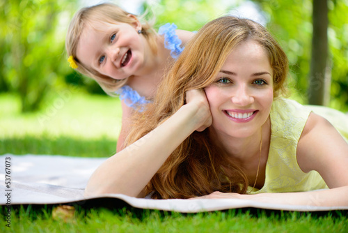 Photo: Happy young mother with her daughter Happy young mother with her daughter