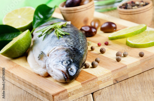 Photo: Raw trout on the cutting board Raw trout on the cutting board