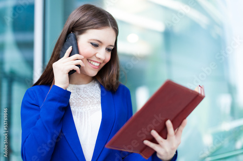 Photo: Busy businesswoman at work Busy businesswoman at work