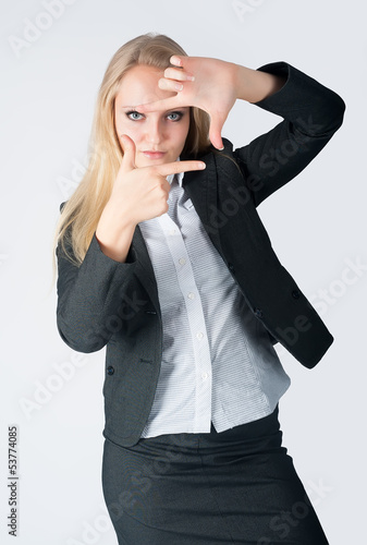 Photo: Girl showing frame Girl showing frame