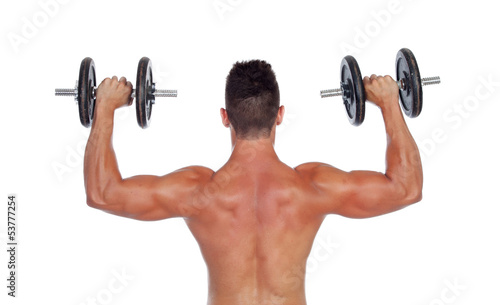 Photo: Muscular man lifting weights Muscular man lifting weights