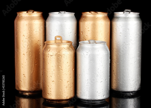 Photo: Aluminum cans with water drops isolated on black Aluminum cans with water drops isolated on black