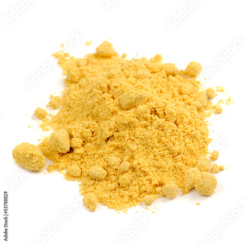 Photo: Pile of Mustard Powder Isolated on White Background Pile of Mustard Powder Isolated on White Background