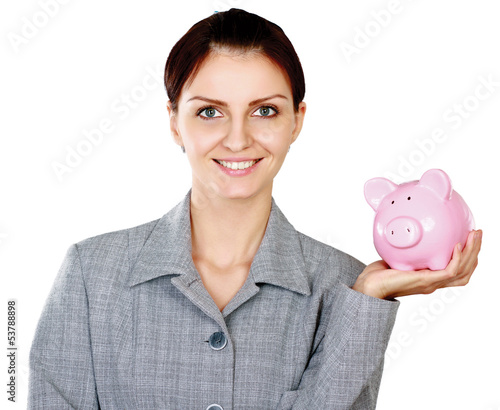 Photo: Young beautiful woman standing with piggy bank (money box) Young beautiful woman standing with piggy bank (money box)