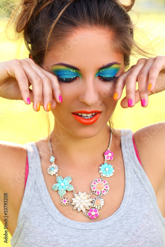 Photo: Beautiful woman with artistic makeup Beautiful woman with artistic makeup