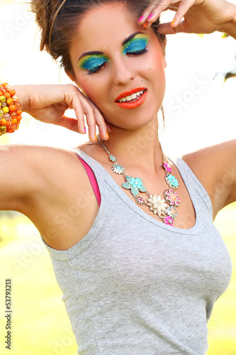 Photo: Beautiful woman with artistic makeup Beautiful woman with artistic makeup