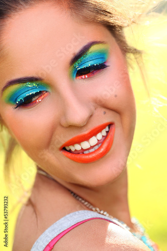 Photo: Beautiful woman with artistic makeup Beautiful woman with artistic makeup