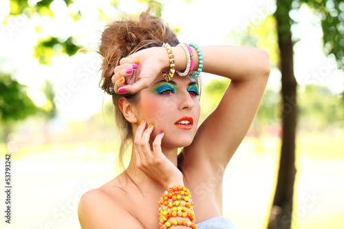 Photo: Beautiful woman with artistic makeup Beautiful woman with artistic makeup