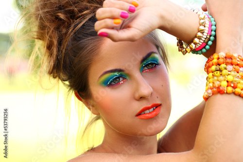 Photo: Beautiful woman with artistic makeup Beautiful woman with artistic makeup