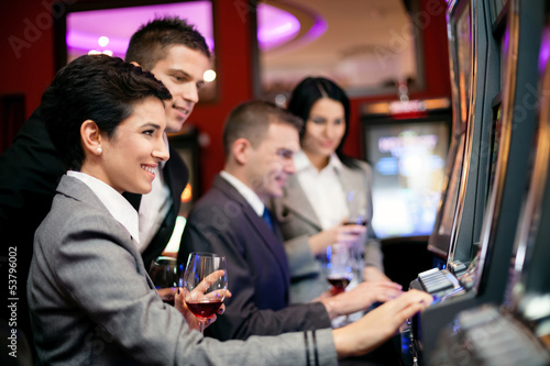 Photo: people gambling on slot machines people gambling on slot machines
