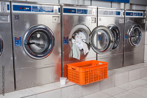 Photo: Washing Machine Overloaded With Clothes Washing Machine Overloaded With Clothes