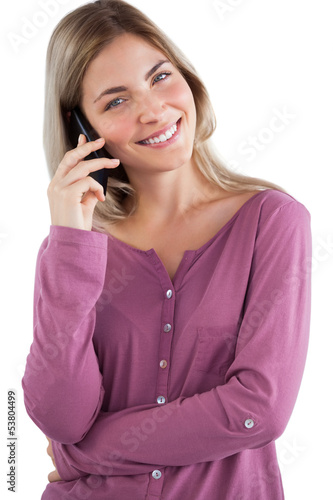 Photo: Smiling woman using mobile phone Smiling woman using mobile phone