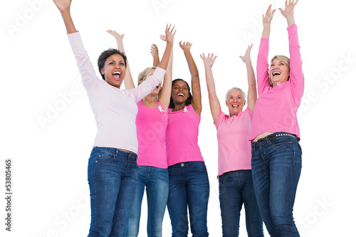 Photo: Cheering women wearing breast cancer ribbons Cheering women wearing breast cancer ribbons