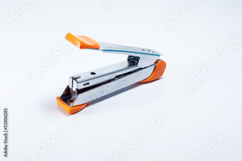 Photo: Yellow max stapler on white background Yellow max stapler on white background