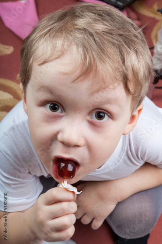 Photo: Boy with a lollipop Boy with a lollipop