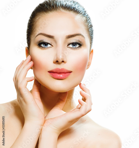 Photo: Beautiful Young Woman Touching Her Face Beautiful Young Woman Touching Her Face