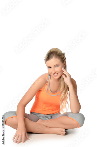 Photo: The beautiful woman in sports suit The beautiful woman in sports suit