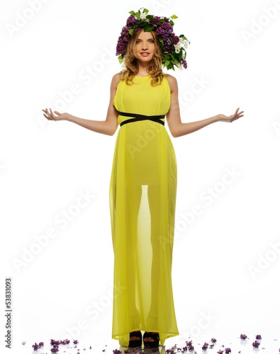 Photo: Beautiful girl in yellow dress wearing chaplet Beautiful girl in yellow dress wearing chaplet