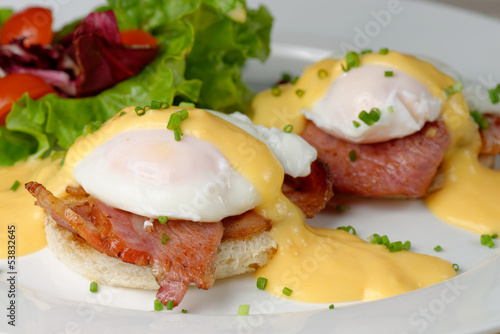 Photo: Eggs Benedict- toasted English muffins, ham, poached eggs Eggs Benedict- toasted English muffins, ham, poached eggs