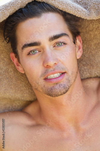 Photo: Portrait of a man with a towel Portrait of a man with a towel
